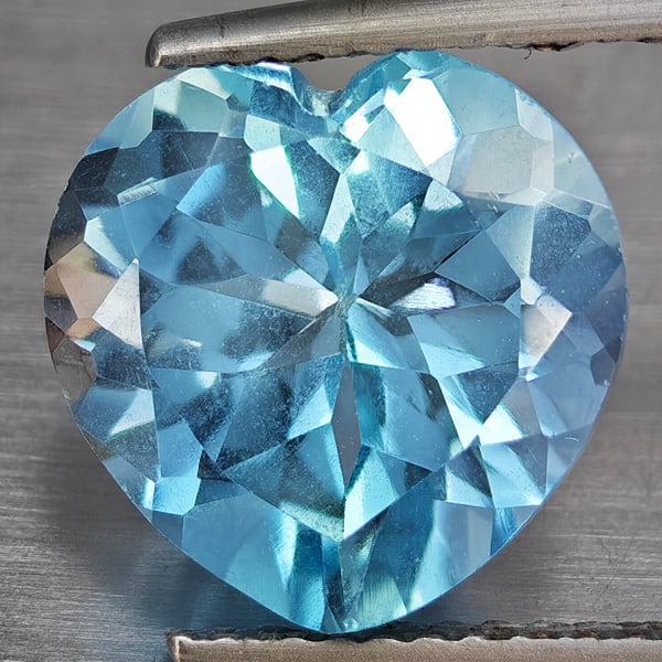 Natural Baby Blue Topaz Gemstones 5.67 Ct. Heart Shape 11.1 Mm.: Product ID: 807168735 Product Name: Natural Blue Topaz Weight: 5.67 CT. Size: 11.1 x 11.1 x 7 MM. Shape: Heart Shape Color: Baby Blue Clarity:VSI Luster: Good Gems Origin: Brazil Treatment: Treated Cr
