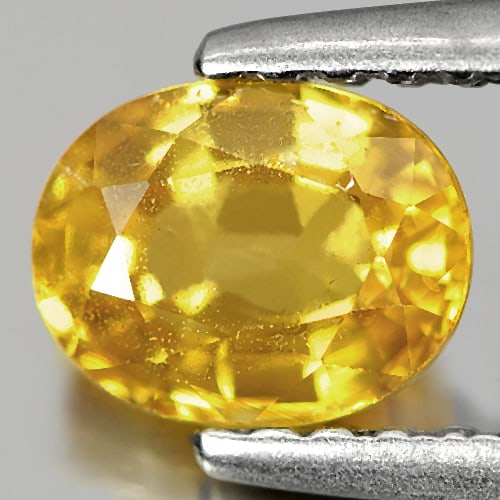 Natural Yellow Sapphire Gemstones 0.99 Ct. Oval Shape 6.2 x 5 Mm.: Product ID: 806151223 Product Name: Natural Yellow Sapphire Weight: 0.99 CT. Size: 6.2 x 5 x 3.4 MM. Shape: Oval Color: Yellow Clarity:SI1 Luster: Good Gems Origin: Thailand Treatment: Heated Crystal 