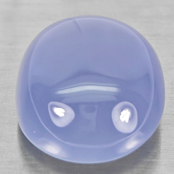 Natural Lavender Chalcedony Gemstones 23.82 Ct. Oval Cabochon Shape 21 x 17.7 Mm.: Product ID: 801502731 Product Name: Natural Weight: 23.82 CT. Size: 21 x 17.7 x 8.7 MM. Shape: Oval Cabochon Color: Lavender Clarity:Semi - Transparent Luster: Good Gems Origin: Russia Treatment: Unhe