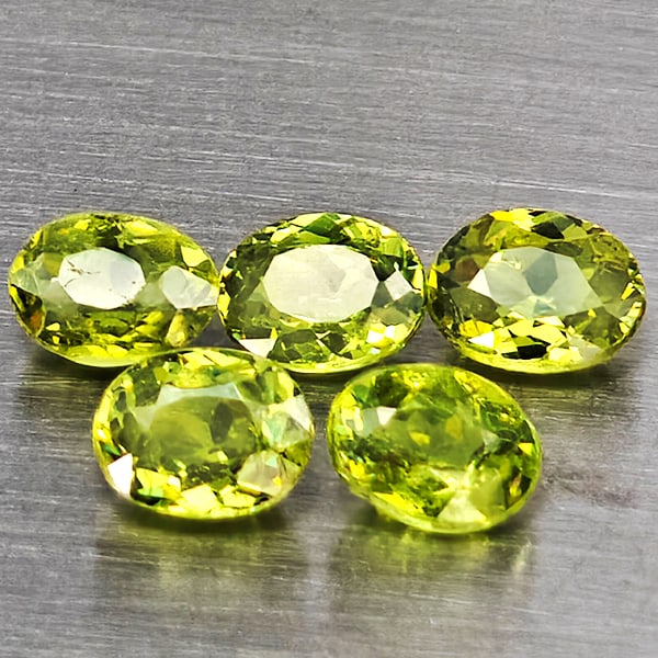 Natural Green Demantiod Garnet Gemstones 1.42 Ct. 5 Pcs. Oval Shape 4.2 x 3.2 Mm.: Product ID: 802937559 Product Name: Natural Demantoid Weight: 1.42 CT. Size: 4.2 x 3.2 x 2.4 MM. Shape: Oval Color: Green Clarity:SI1 Luster: Good Gems Origin: Madagascar Treatment: Unheated Crystal S