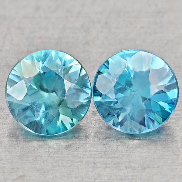 Natural Blue Zircon Gemstones 1.20 Ct. 2 Pcs. Round Diamond Cut 5 Mm.: Product ID: 807743049 Product Name: Natural Zircon Weight: 1.20 CT. Size: 5 x 5 x 3.2 MM. Shape: Round Diamond Cut Color: Blue Clarity:VSI Luster: Good Gems Origin: Cambodia Treatment: Heated Crystal 