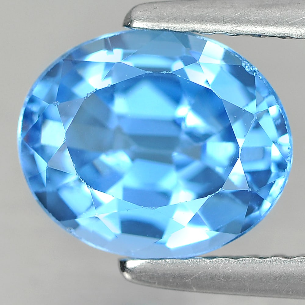 Natural Blue Topaz Gemstones 2.46 Ct. Oval Shape 9 x 7.5 Mm.: Product ID: 807167324 Product Name: Natural Blue Topaz Weight: 2.46 CT. Size: 9 x 7.5 x 4.8 MM. Shape: Oval Color: Blue Clarity:SI1 Luster: Good Gems Origin: Brazil Treatment: Treated Crystal Structur