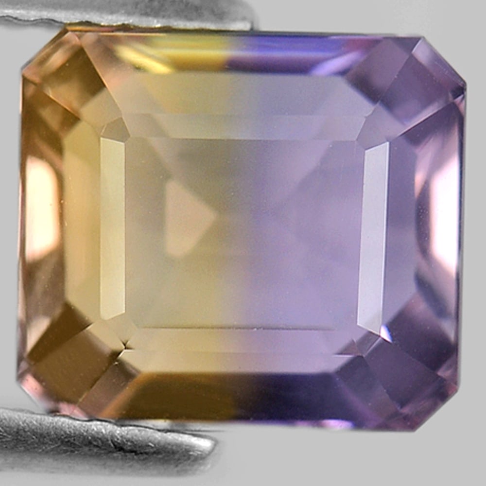 Natural Bi Color Ametrine Gemstones 3.61 Ct. Octagon Shape 9.5 x 8.6 Mm.: Product ID: 800405065 Product Name: Natural Ametrine Weight: 3.61 CT. Size: 9.5 x 8.6 x 5.5 MM. Shape: Octagon Color: Bi Color Clarity:VVS Luster: Good Gems Origin: Bolivia Treatment: Unheated Crystal