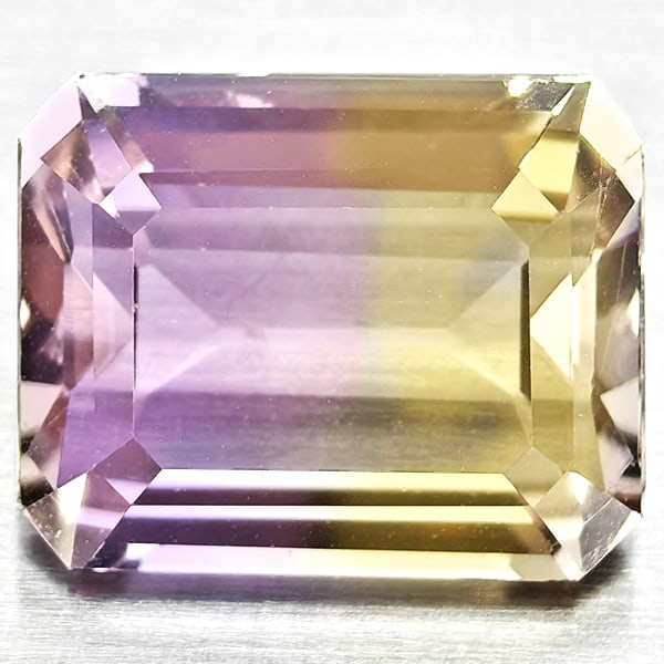 Natural Bi Color Ametrine Gemstones 3.38 Ct. Octagon Shape 10.2 x 8.2 Mm.: Product ID: 800408450 Product Name: Natural Ametrine Weight: 3.38 CT. Size: 10.2 x 8.2 x 5.2 MM. Shape: Octagon Color: Bi Color Clarity:VSI Luster: Good Gems Origin: Bolivia Treatment: Unheated Crysta