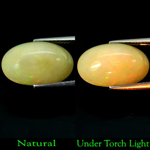 Natural Multi Color Opal Gemstone 7.32 Ct. Oval Cabochon Shape 17.9 x 11.7 Mm.: Product ID: 818708000 Product Name: Natural Opal Weight: 7.32 CT. Size: 17.9 x 11.7 x 7.6 MM. Shape: Oval Cabochon Color: Multi Color Clarity:Semi - Transparent Luster: Good Gems Origin: Ethiopia Trea
