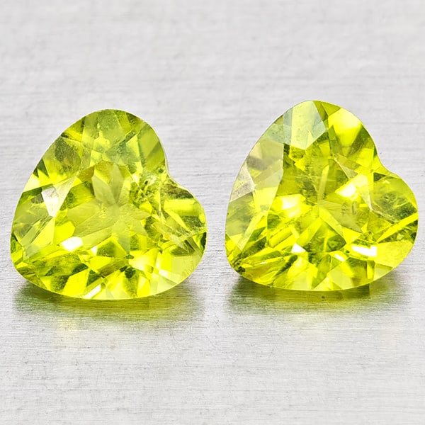 Natural Green Peridot Gemstones 1.73 Ct. 2 Pcs. Heart Shape 6.1 x 6.1 Mm.: Product ID: 805317281 Product Name: Natural Peridot Weight: 1.73 CT. Size: 6.1 x 6.1 x 3.8 MM. Shape: Heart Shape Color: Green Clarity:VSI - SI1 Luster: Good Gems Origin: Pakistan Treatment: Unheated 