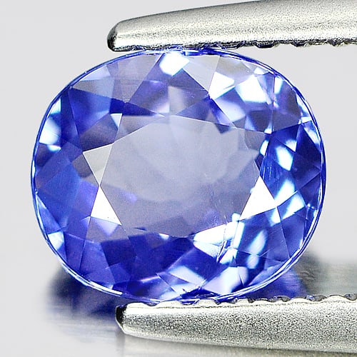 Natural Blue Tanzanite Gemstones 1.05 Ct. Oval Shape 6.9 x 6 Mm.: Product ID: 807005854 Product Name: Natural Tanzanite Weight: 1.05 CT. Size: 6.9 x 6 x 3.3 MM. Shape: Oval Color: Purple Clarity:VSI Luster: Good Gems Origin: Tanzania Treatment: Heated Crystal Struct