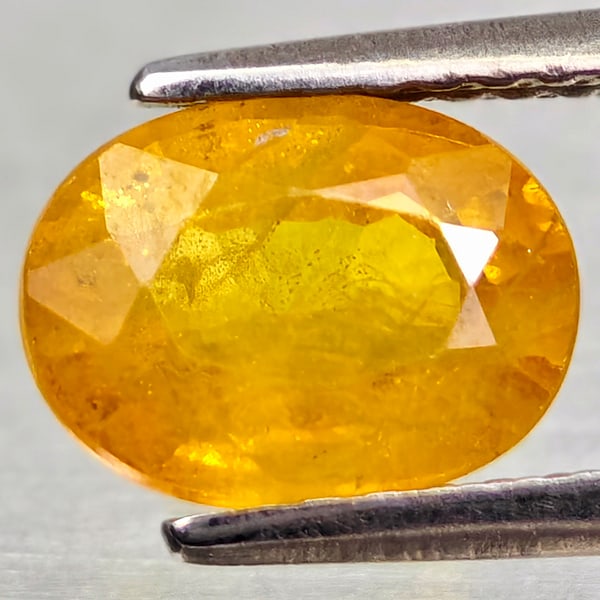 Natural Yellow Sapphire Gemstones 1.96 Ct. Oval Shape 8.1 x 6.1 Mm.: Product ID: 806162590 Product Name: Natural Yellow Sapphire Weight: 1.96 CT. Size: 8.1 x 6.1 x 4.1 MM. Shape: Oval Color: Yellow Clarity:VSI - SI1 Luster: Good Gems Origin: Thailand Treatment: Heated 