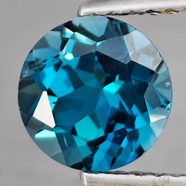 Natural London Blue Topaz Gemstones 1.61 Ct. Round Shape 7.1 Mm.: Product ID: 807145698 Product Name: Natural Blue Topaz Weight: 1.61 CT. Size: 7.1 x 7.1 x 4.6 MM. Shape: Round Color: London Blue Clarity:SI1 Luster: Good Gems Origin: Brazil Treatment: Treated Crysta