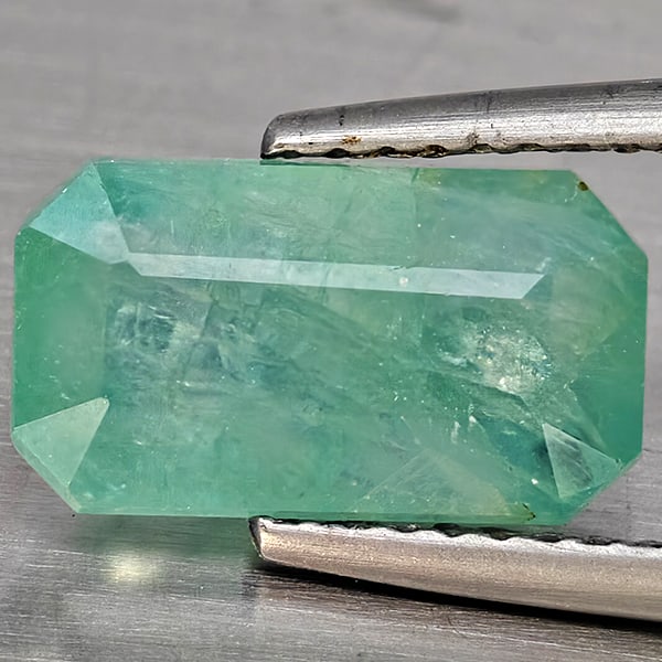 Natural Green Blueish Grandidierite Gemstones 3.64 Ct. Octagon Shape 11.7 x 6.5 Mm.: Product ID: 803100051 Product Name: Natural Tsavorite Weight: 3.64 CT. Size: 11.7 x 6.5 x 5.1 MM. Shape: Octagon Color: Green Blueish Clarity:SI1 Luster: Good Gems Origin: Madagascar Treatment: Unheat