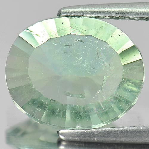 Natural Light Green Fluorite Gemstones 3.95 Ct. Oval Concave Cut 12 x 9.8 Mm.: Product ID: 802705258 Product Name: Natural Fluorite Weight: 3.95 CT. Size: 12 x 9.8 x 5 MM. Shape: Oval Concave Cut Color: Light Green Clarity:VSI - SI Luster: Good Gems Origin: Brazil Treatment: Unh