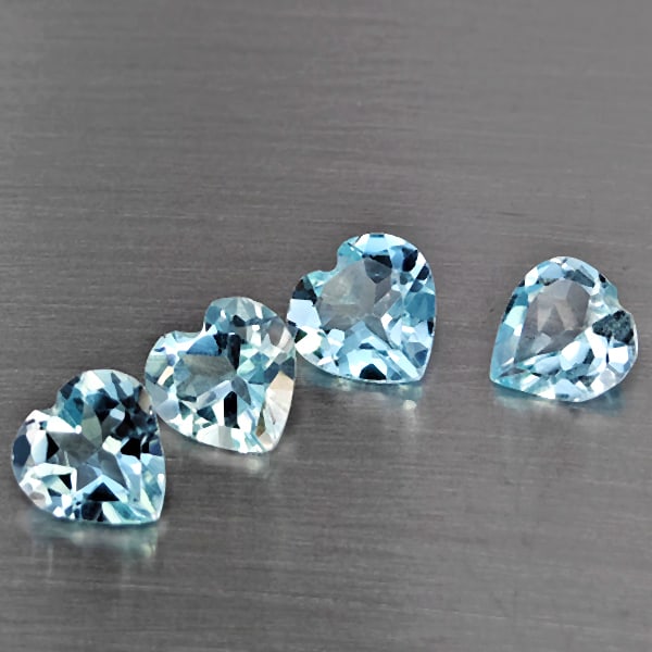 Natural Baby Blue Topaz Gemstone 3.03 Ct. 4 Pcs. Heart Shape 6.2 Mm.: Product ID: 807168973 Product Name: Natural Blue Topaz Weight: 3.03 CT. Size: 6.2 x 6.2 x 3.5 MM. Shape: Heart Shape Color: Baby Blue Clarity:VSI Luster: Good Gems Origin: Brazil Treatment: Treated Cr