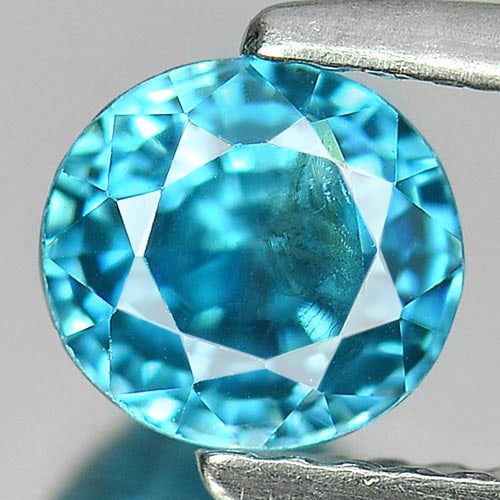 Natural Blue Zircon Gemstone 1.67 Ct. Oval Shape 6.1 x 5.7 Mm.: Product ID: 807728616 Product Name: Natural Zircon Weight: 1.67 CT. Size: 6.1 x 5.7 x 4.6 MM. Shape: Oval Color: Blue Clarity:VSI Luster: Very Good Gems Origin: Cambodia Treatment: Heated Crystal Stru