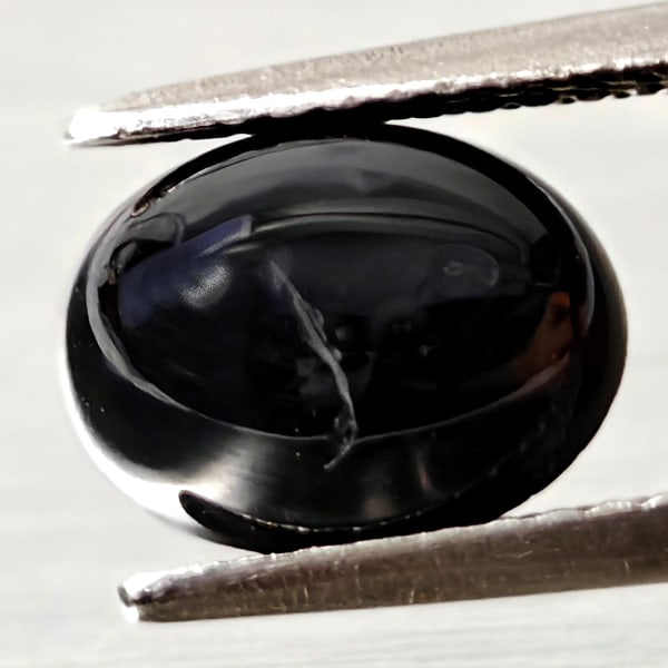 Natural Black Spinel Gemstons 2.78 Ct. Oval Cabochon Shape 9 x 6.9 Mm.: Product ID: 806609906 Product Name: Natural Spinel Weight: 2.78 CT. Size: 9 x 6.9 x 4.2 MM. Shape: Oval Cabochon Color: black Clarity:Opaque Luster: Good Gems Origin: Thailand Treatment: Unheated Crys