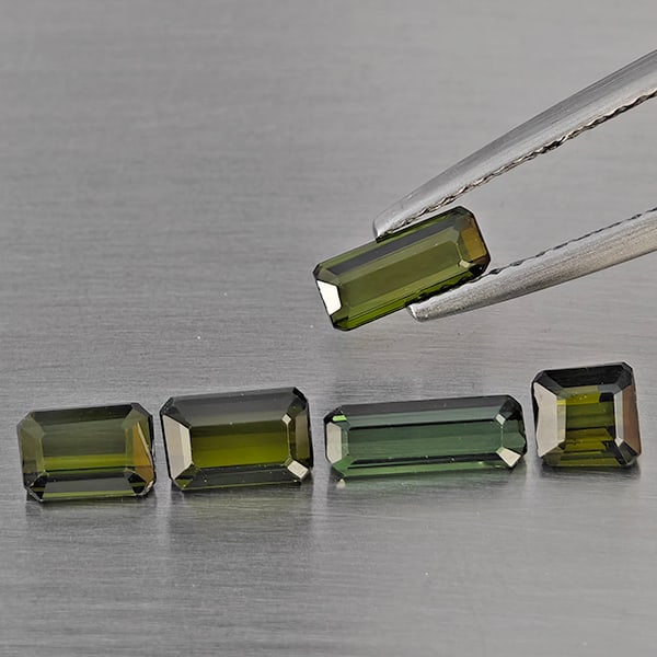 Natural Green Tourmaline Gemstones 2.02 Ct. 5 Pcs. Octagon Shape And Mixed Size: Product ID: 807251600 Product Name: Natural Tourmaline Weight: 2.02 CT. Size: 7.5 x 2.8 x 2.5 to 3.9 x 3.9 x 2.8 MM. Shape: Octagon Color: Green Clarity:VSI Luster: Good Gems Origin: Nigeria Treatment