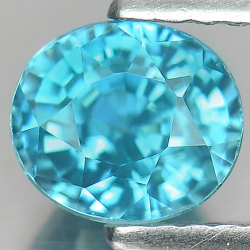 Natural Blue Zircon Gemstones 1.83 Ct. Oval Shape 6.3 x 5.6 x 4.9 Mm.: Product ID: 807720944 Product Name: Natural Zircon Weight: 1.83 CT. Size: 6.3 x 5.6 x 4.9 MM. Shape: Oval Color: Blue Clarity:VVS Luster: Good Gems Origin: Cambodia Treatment: Heated Crystal Structure
