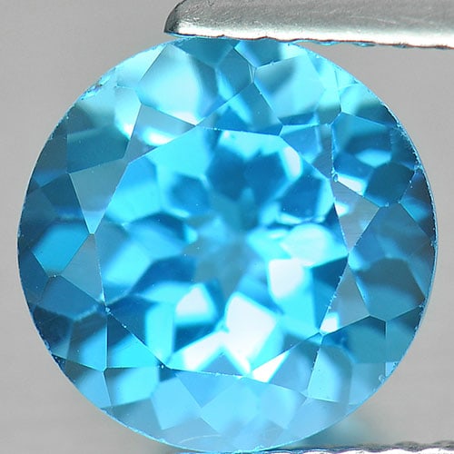 Natural Swiss Blue Topaz Gemstones 3.40 Ct. Round Shape 9 Mm.: Product ID: 807156380 Product Name: Natural Blue Topaz Weight: 3.40 CT. Size: 9 x 9 x 6 MM. Shape: Round Color: Swiss Blue Clarity:VVS Luster: Good Gems Origin: Brazil Treatment: Treated Crystal Struc