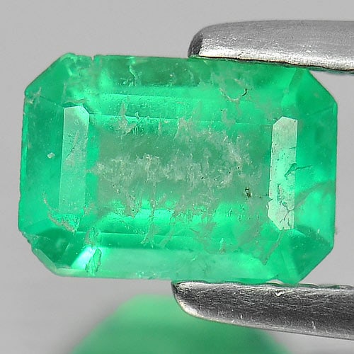 Natural Green Emerald Gemstones 0.81 Ct. Octagon Shape 7.3 x 5.1 Mm.: Product ID: 802403400 Product Name: Natural Emerald Weight: 0.81 CT. Size: 7.3 x 5.1 x 3.2 MM. Shape: Octagon Color: Green Clarity:SI Luster: Good Gems Origin: Columbia Treatment: Unheated Crystal Str
