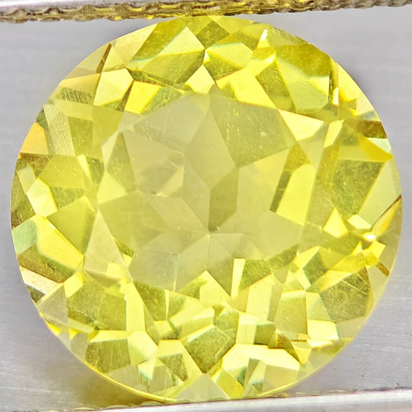Natural Yellow Lemon Quartz Gemstones 3.25 Ct. Round Shape 10 Mm.: Product ID: 805530216 Product Name: Natural Quartz Weight: 3.25 CT. Size: 10 x 10 x 6.3 MM. Shape: Round Color: Yellow Lemon Clarity:VSI Luster: Good Gems Origin: Brazil Treatment: Unheated Crystal St