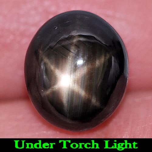 Natural Black Star Sapphire Gemstones 6 Rays 5.71 Ct. Oval Cabochon Shape 9.5 x 8.3 Mm.: Product ID: 806155148 Product Name: Natural Star Sapphire Weight: 5.71 CT. Size: 9.5 x 8.3 x 6.2 MM. Shape: Oval Cabochon Color: Black Clarity:Opaque Luster: Good 6 Rays Star Gems Origin: Thailand Tre