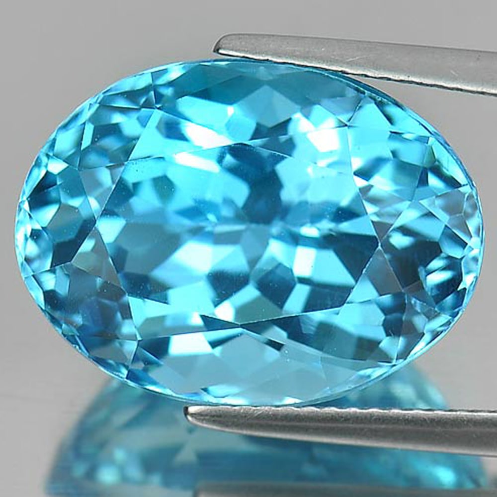 Natural Swiss Blue Topaz Gemstones 21.28 Ct. Clean Oval Shape 18.3 x 13.6 Mm.: Product ID: 807164979 Product Name: Natural Blue Topaz Weight: 21.28 CT. Size: 18.3 x 13.6 x 11.5 MM. Shape: Oval Color: Blue Clarity:IF Luster: Very Good Gems Origin: Brazil Treatment: Treated Crysta