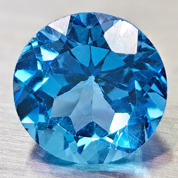 Natural Swiss Blue Topaz Gemstones 3.39 Ct. Round Shape 9 Mm.: Product ID: 807167750 Product Name: Natural Blue Topaz Weight: 3.39 CT. Size: 9 x 9 x 6.4 MM. Shape: Round Color: Swiss Blue Clarity:VVS Luster: Good Gems Origin: Barzil Treatment: Treated Crystal Str
