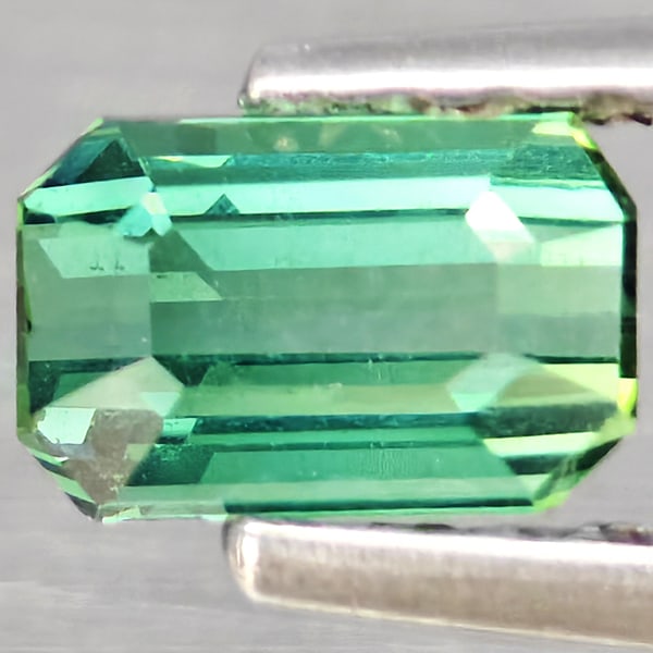 Natural Green Tourmaline Gemstones 0.58 Ct. Octagon Shape 5.3 x 3.3 Mm.: Product ID: 807251093 Product Name: Natural Tourmaline Weight: 0.58 CT. Size: 5.3 x 3.3 x 3 MM. Shape: Octagon Color: Green Clarity:SI1 Luster: Good Gems Origin: Nigeria Treatment: Unheated Crystal St