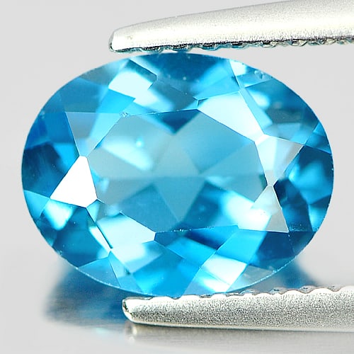 Natural London Blue Topaz Gemstones 2.12 Ct. Oval Shape 9.2 x 7.2 Mm.: Product ID: 807161025 Product Name: Natural Blue Topaz Weight: 2.12 CT. Size: 9.2 x 7.2 x 4.4 MM. Shape: Oval Color: London Blue Clarity:VSI Luster: Good Gems Origin: Brazil Treatment: Treated Crystal