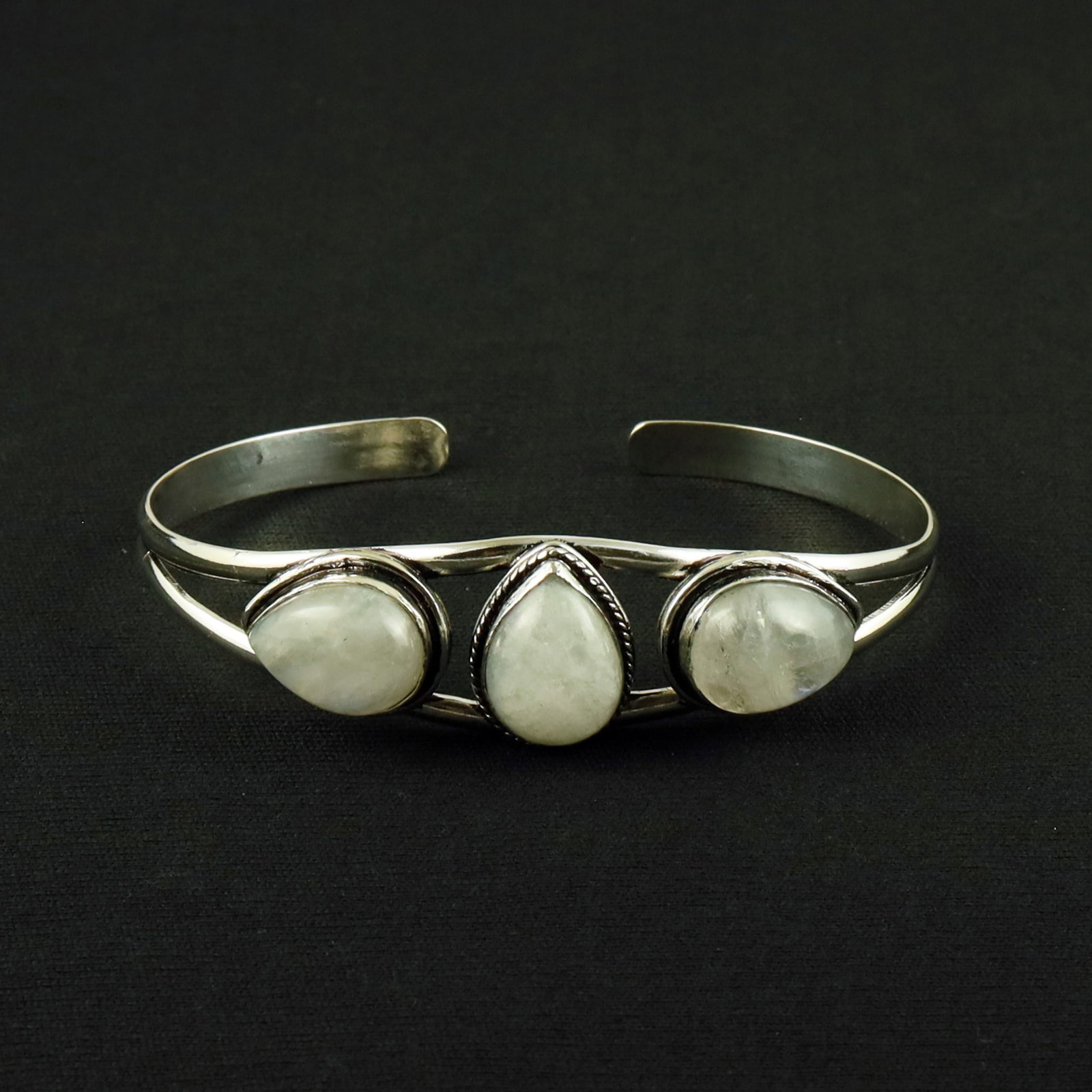 Natural Rainbow Moonstone Sterling Silver Plated Handmade Cuff Bangle: Product ID: 260612171530 Product - Handmade Silver Plated Cuff Bangle Metal - 92.5 Sterling Silver Plated Bangle Size - 7.5x5 CM (Adjustable) Gemstone - Rainbow Moonstone Gemstone Origin - India Gemst