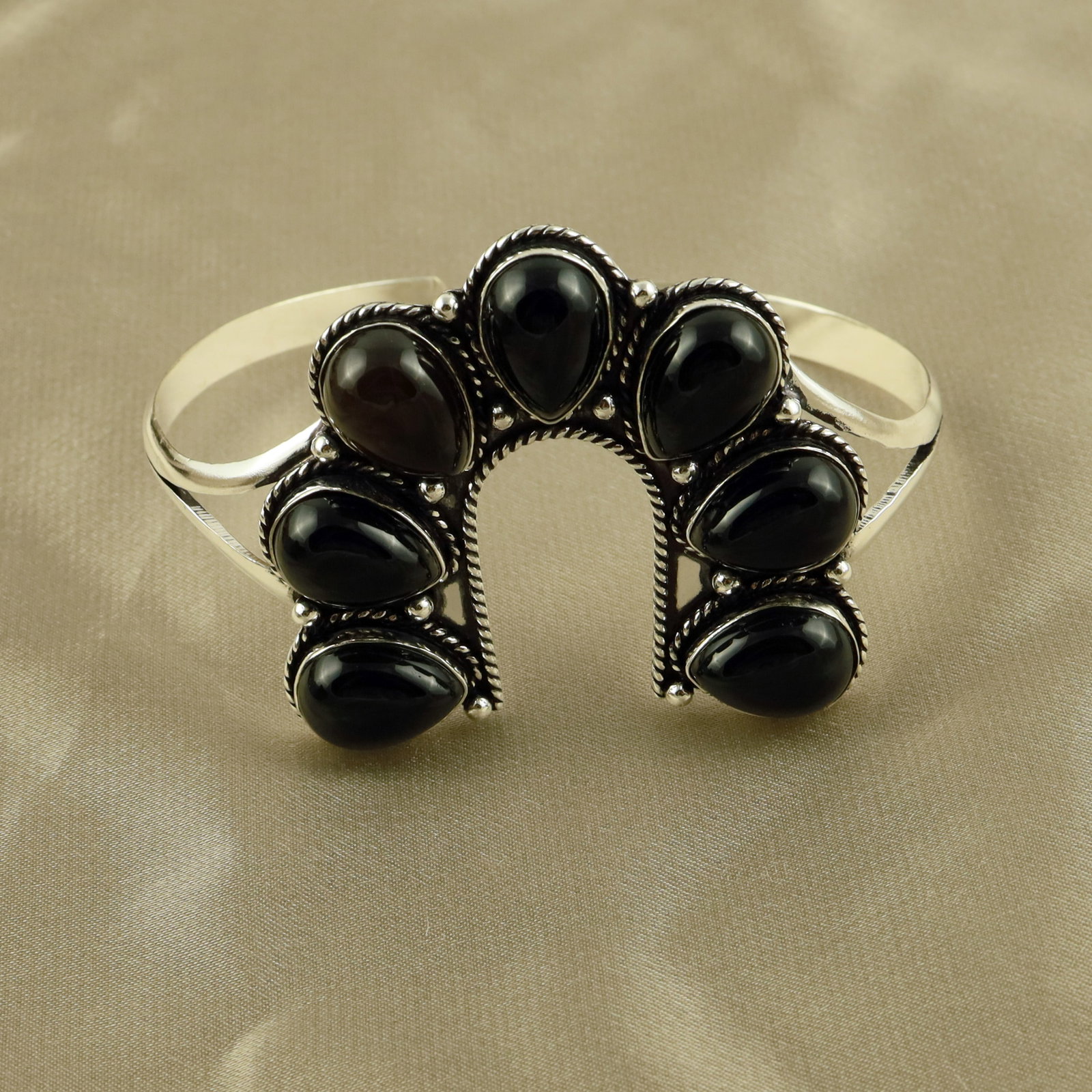 Natural Black Onyx Sterling Silver Plated Handmade Cuff Bangle: Product ID: 260521140630 Product - Handmade Silver Plated Cuff Bangle Metal - 92.5 Sterling Silver Plated Bangle Size - 7x4.5 CM (Adjustable) Gemstone - Black Onyx Gemstone Origin - India Gemstone Siz