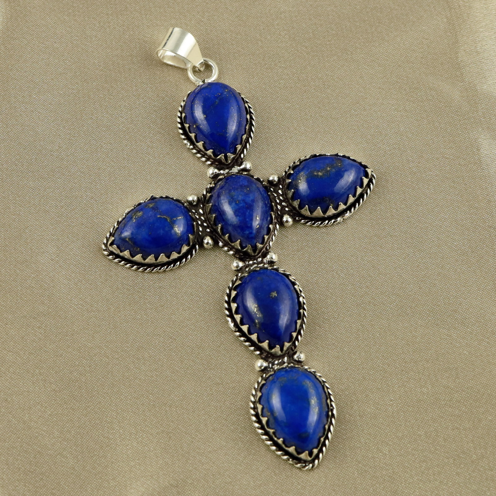 Natural Lapis Lazuli Sterling Silver Plated Handmade Cross Pendant: Product ID: 260519131934 Metal - 92.5 Sterling Silver Plated Pendant Size - 3.5x2 Inch Gemstone - Lapis Lazuli Gemstone Origin - Afghanistan Gemstone Size - 12x16 MM ( 6 Stone ) Gemstone Shape - Pear 