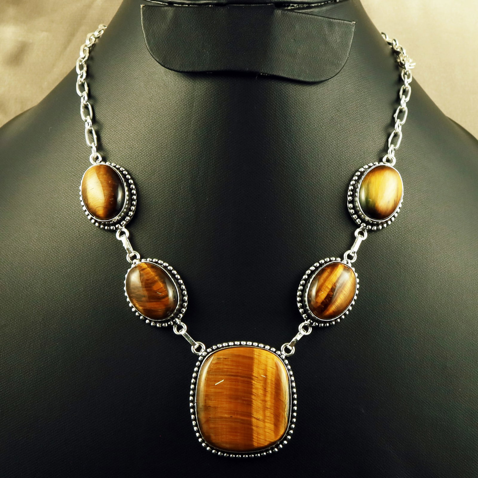 Natural Tiger Eye Sterling Silver Plated Handmade Necklace: Product ID: 260701150350 Product - Handmade Silver Plated Necklace Metal - 92.5 Sterling Silver Plated Necklace Length - 18 Inch Gemstone - Tiger Eye Gemstone Size - 2X1.5 CM (4 Stone), 3.5X3 CM (1 St