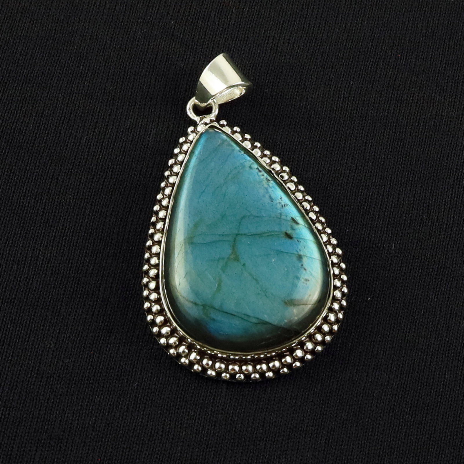 Natural Labradorite Sterling Silver Plated Handmade Pendant: Product ID: 260701135359 Product - Handmade Silver Plated Pendant Metal - 92.5 Sterling Silver Plated Pendant Size - 4x2.5 CM Gemstone - Labradorite Gemstone Origin - Canada Gemstone Shape - Pear Pend