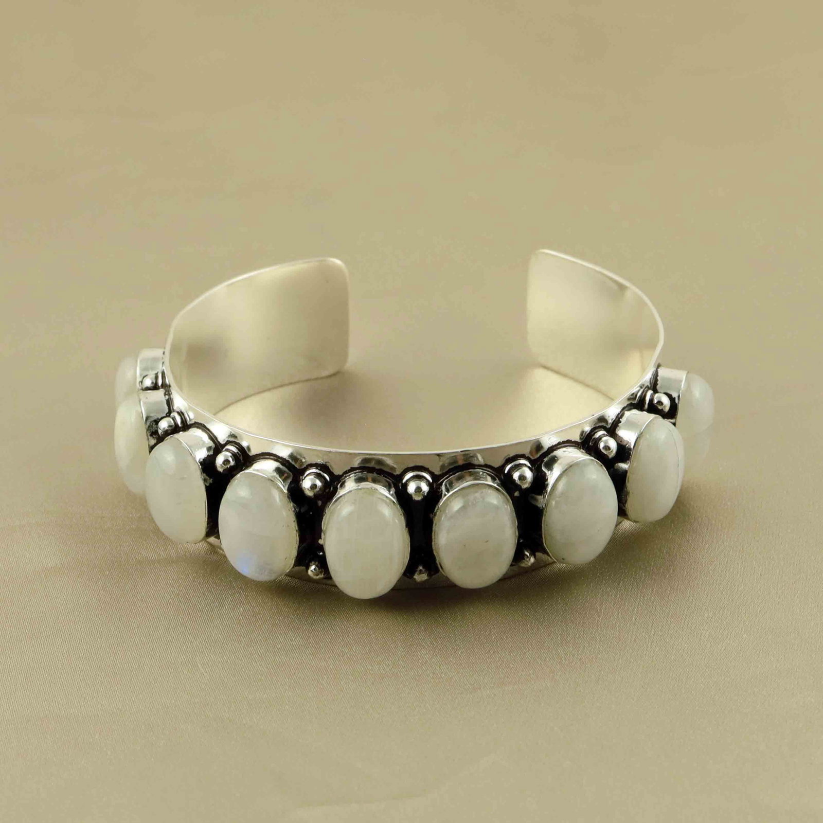 10X14MM Rainbow Moonstone Silver Plated Handmade Cuff Bangle: Product ID: 260607151207 Product - Handmade Silver Plated Cuff Bangle Metal - 92.5 Sterling Silver Plated Bangle Size - 6.5x5.5 CM (Adjustable) Gemstone - Rainbow Moonstone Gemstone Origin - India Gem