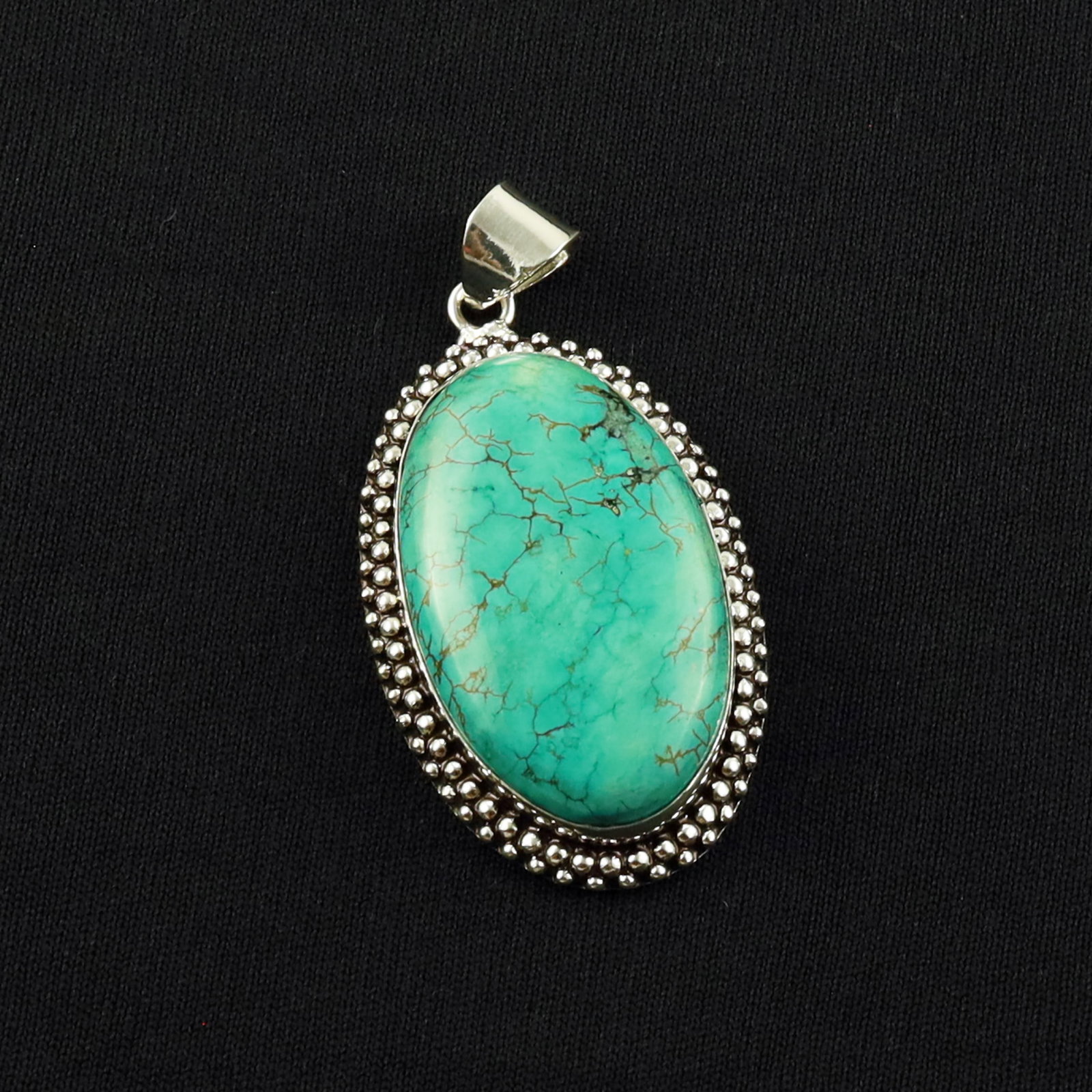 Natural Turquoise Sterling Silver Plated Handmade Pendant: Product ID: 260701140615 Product - Handmade Silver Plated Pendant Metal - 92.5 Sterling Silver Plated Pendant Size - 4x2.5 CM Gemstone - Turquoise Gemstone Origin - Tibet Gemstone Shape - Oval Pendant