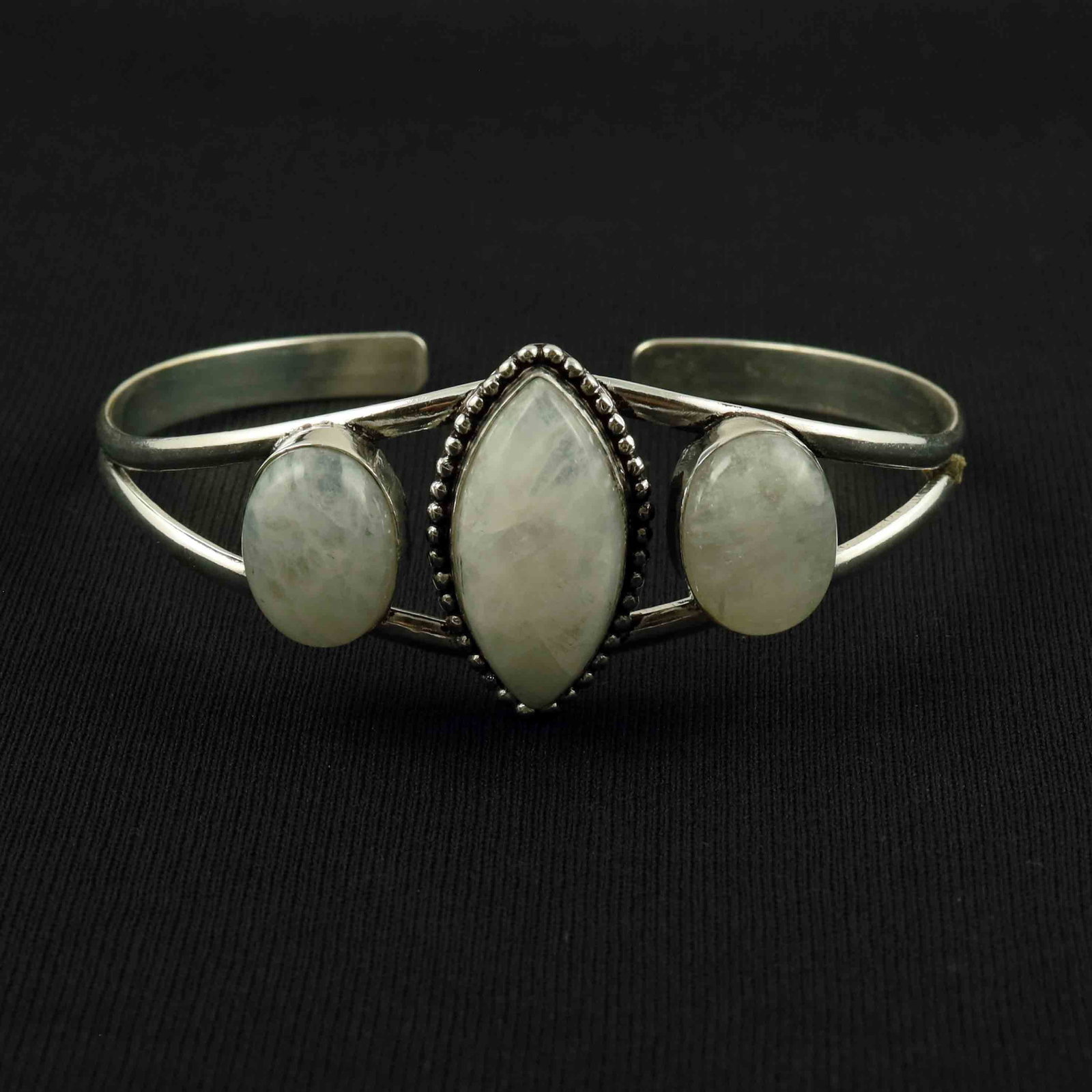Natural Rainbow Moonstone Sterling Silver Plated Handmade Cuff Bangle: Product ID: 260523133017 Product - Handmade Silver Plated Cuff Bangle Metal - 92.5 Sterling Silver Plated Bangle Size - 7.5x5 CM (Adjustable) Gemstone - Rainbow Moonstone Gemstone Origin - India Gemst