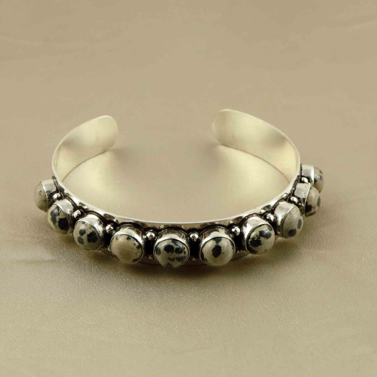 Natural Dalmatian Jasper Sterling Silver Plated Handmade Cuff Bangle: Product ID: 260607183047 Product - Handmade Silver Plated Cuff Bangle Metal - 92.5 Sterling Silver Plated Bangle Size - 6.5x5.5 CM (Adjustable) Gemstone - Dalmatian Jasper Gemstone Origin - Mexico Gem