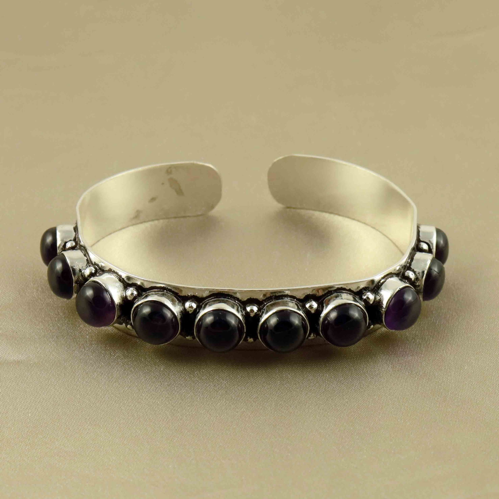 Natural Amethyst Sterling Silver Plated Handmade Cuff Bangle: Product ID: 260607182856 Product - Handmade Silver Plated Cuff Bangle Metal - 92.5 Sterling Silver Plated Bangle Size - 6.5x5.5 CM (Adjustable) Gemstone - Amethyst Gemstone Origin - Brazil Gemstone Si