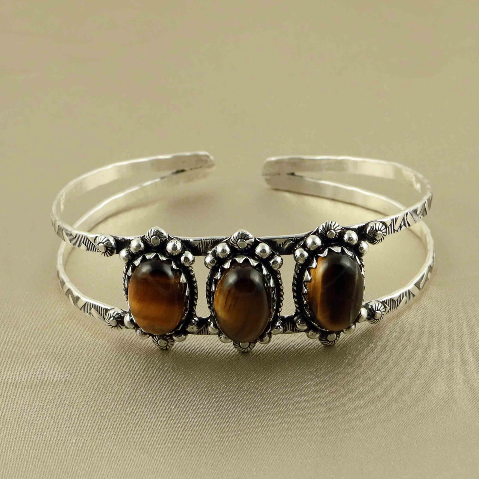 Natural Tiger Eye Sterling Silver Plated Handmade Cuff Bangle: Product ID: 260528184415 Product - Handmade Silver Plated Cuff Bangle Metal - 92.5 Sterling Silver Plated Bangle Size - 7x5 CM (Adjustable) Gemstone - Tiger Eye Gemstone Origin - South Africa Gemstone