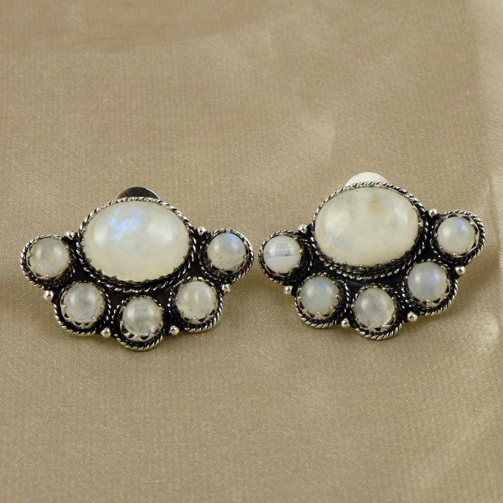 Natural Rainbow Moonstone Sterling Silver Plated Handmade Stud Earring: Product ID: 260517172941 Product - Handmade Silver Plated Stud Earring Metal - 92.5 Sterling Silver Plated Earring Type - Stud Gemstone - Rainbow Moonstone Gemstone Origin - India Gemstone Size - 10X1