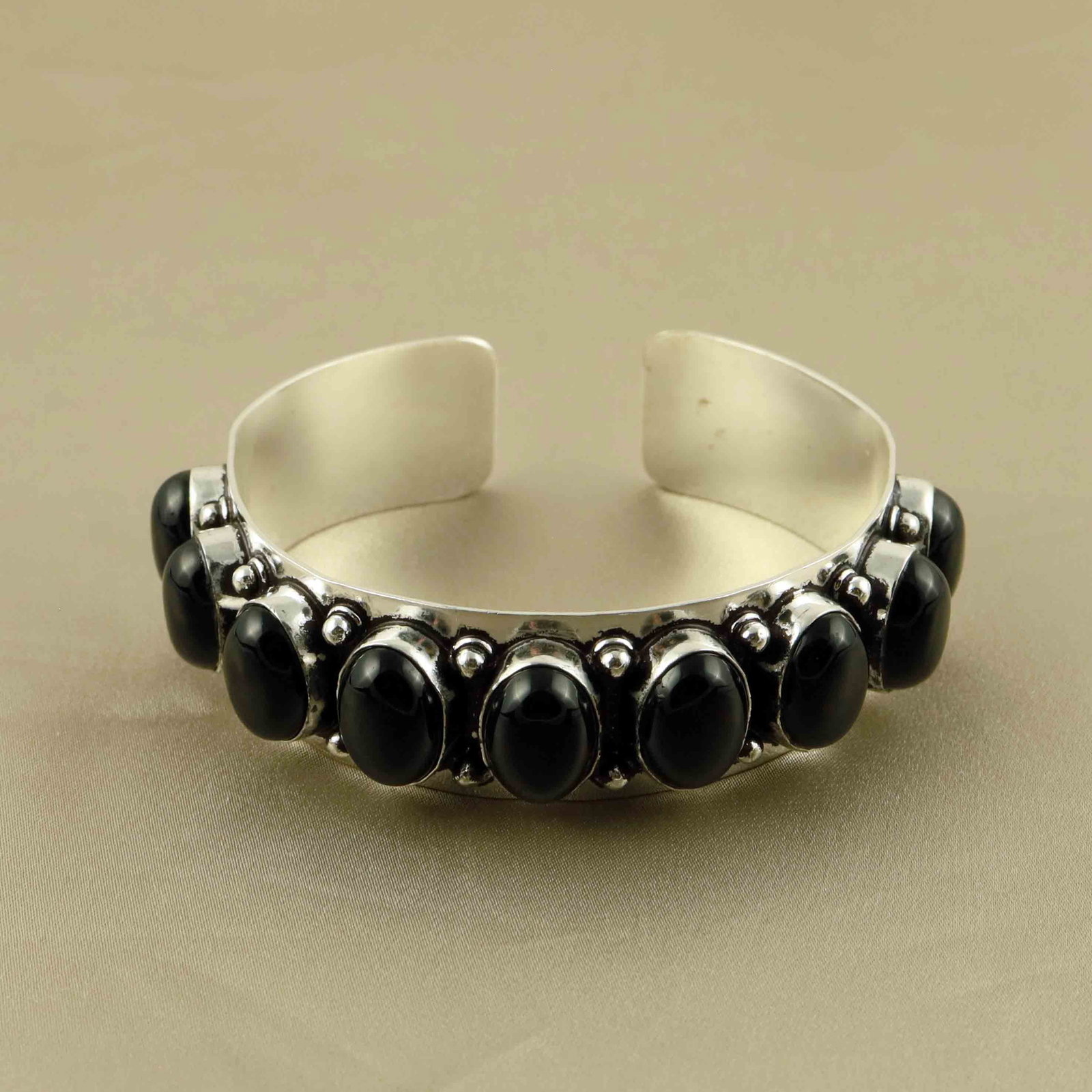 10X14MM Black Onyx Silver Plated Handmade Cuff Bangle: Product ID: 260607150636 Product - Handmade Silver Plated Cuff Bangle Metal - 92.5 Sterling Silver Plated Bangle Size - 6.5x5.5 CM (Adjustable) Gemstone - Natural Black Onyx Gemstone Origin - India Ge