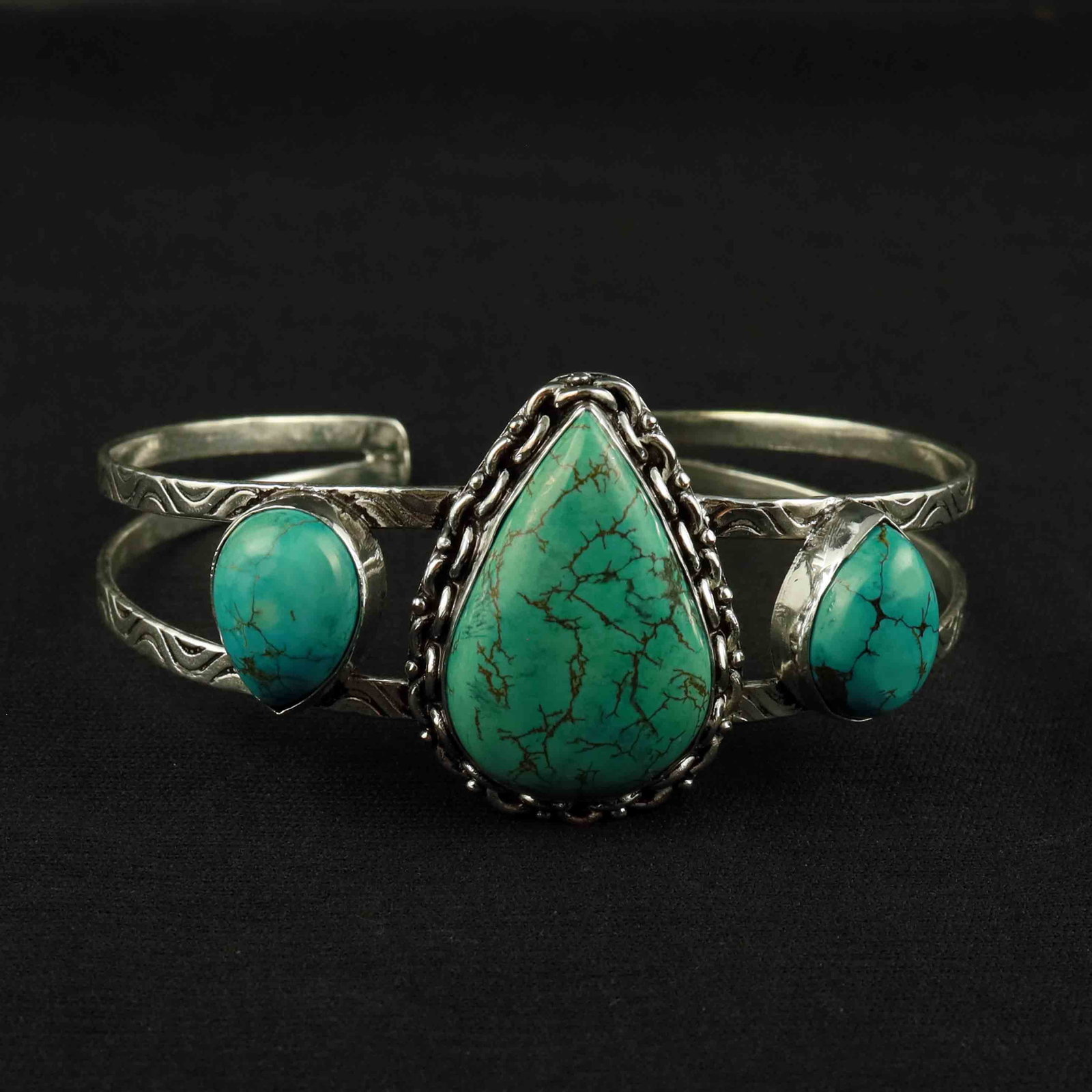 Natural Turquoise Sterling Silver Plated Handmade Cuff Bangle: Product ID: 260522130729 Product - Handmade Silver Plated Cuff Bangle Metal - 92.5 Sterling Silver Plated Bangle Size - 7.5x5.5 CM (Adjustable) Gemstone - Turquoise Gemstone Origin - Tibet Gemstone Si