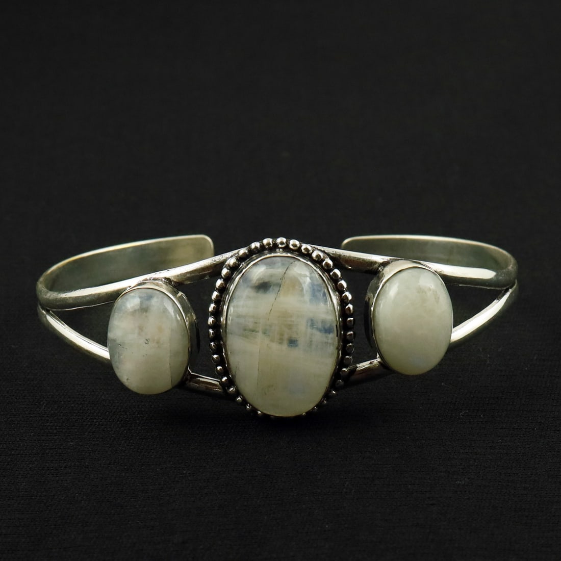 Natural Rainbow Moonstone Sterling Silver Plated Handmade Cuff Bangle: Product ID: 260521152816 Product - Handmade Silver Plated Cuff Bangle Metal - 92.5 Sterling Silver Plated Bangle Size - 7.5x5.5 CM (Adjustable) Gemstone - Rainbow Moonstone Gemstone Origin - India Gem