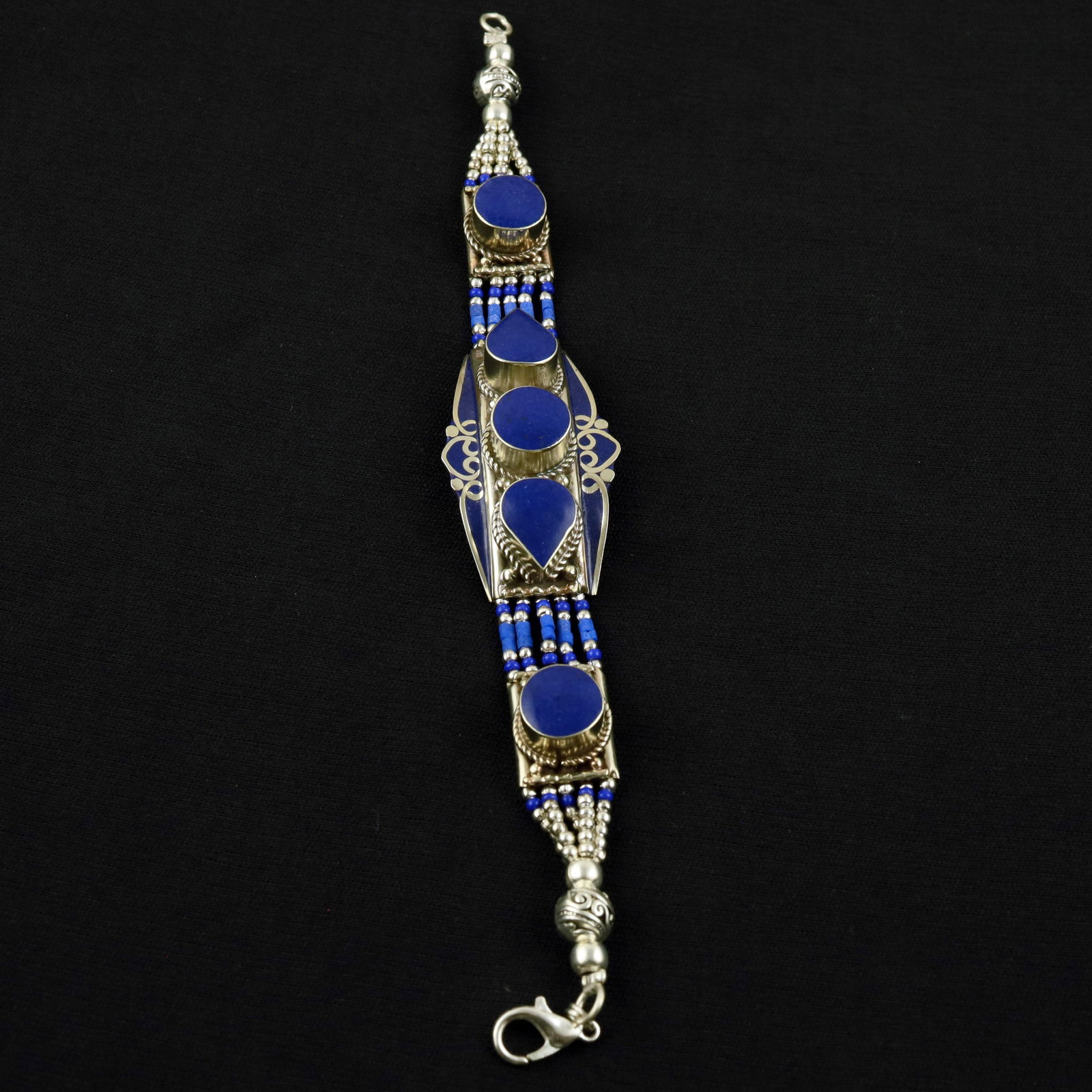 Natural Afghani Lapis Lazuli Handmade Boho Bracelet: Product ID: 260520120726 Product - Tibetan Handmade Ethnic Bracelet Gemstone - Natural Lapis Lazuli Size - 7 Inch Weight - 50 Gram Approx Metal - Brass & Copper mix Metal Origin - Nepal Country/Region