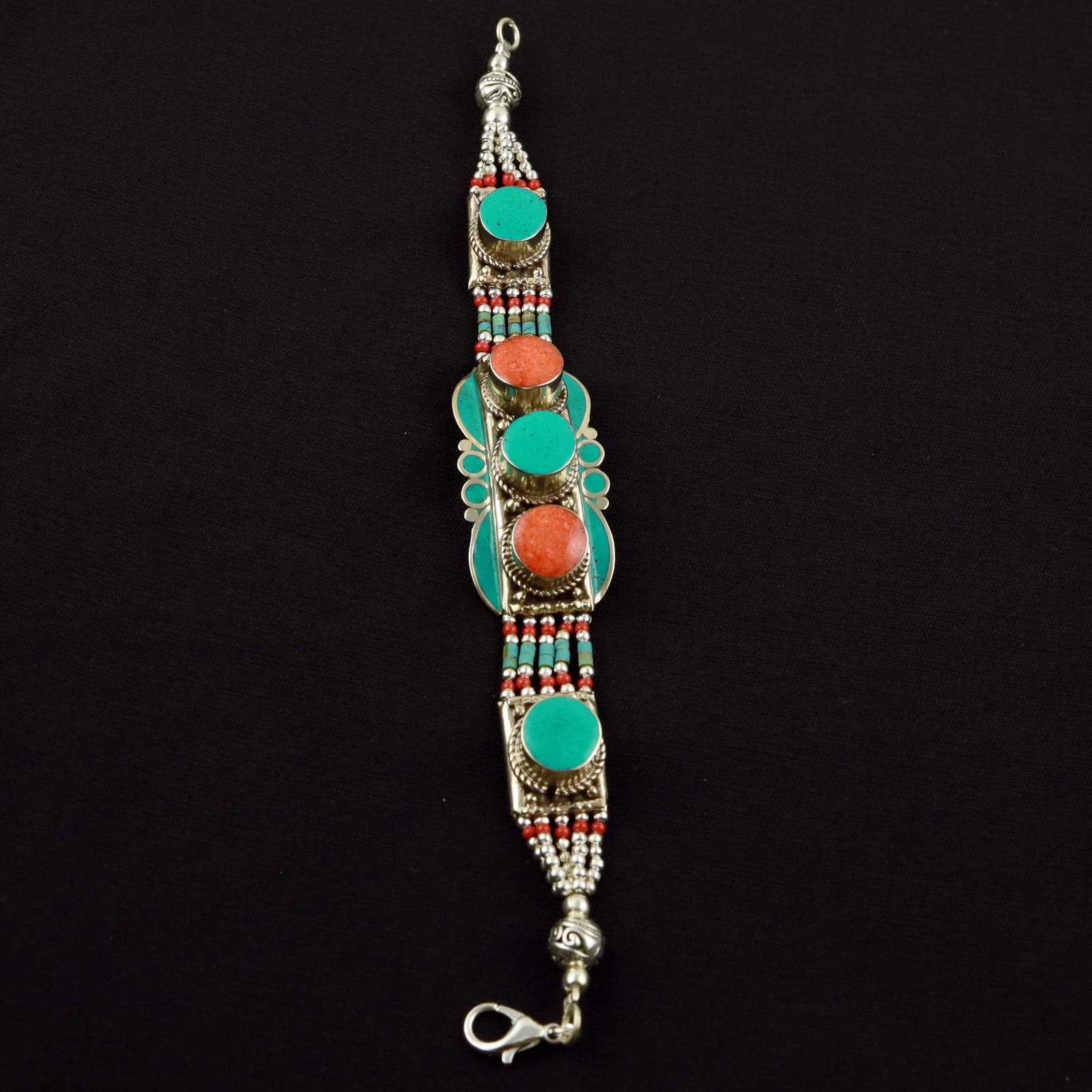 Tibetan Turquoise & Coral Handmade Ethnic Boho Bracelet: Product ID: 260520114916 Product - Tibetan Handmade Ethnic Bracelet Gemstone - Natural Turquoise & Coral Size - 7 Inch Weight - 50 Gram Approx Metal - Brass & Copper mix Metal Origin - Nepal Country/R