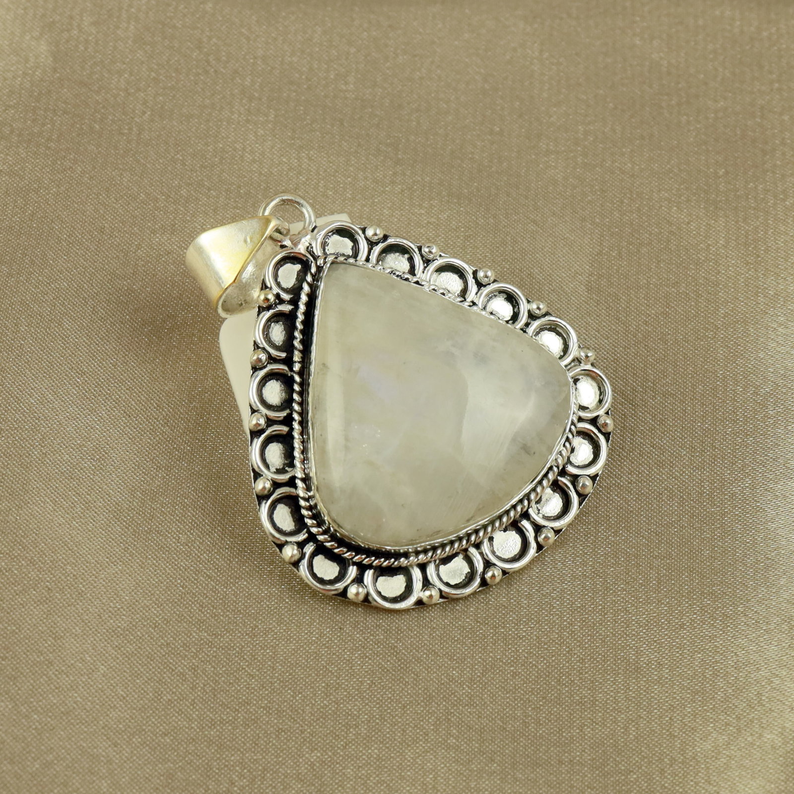 Natural Rainbow Moonstone Sterling Silver Plated Handmade Pendant: Product ID: 260517190537 Product - Handmade Silver Plated Pendant Metal - 92.5 Sterling Silver Plated Pendant Size - 3x3.5CM Gemstone - Rainbow Moonstone Gemstone Origin - India Gemstone Shape - Pear 
