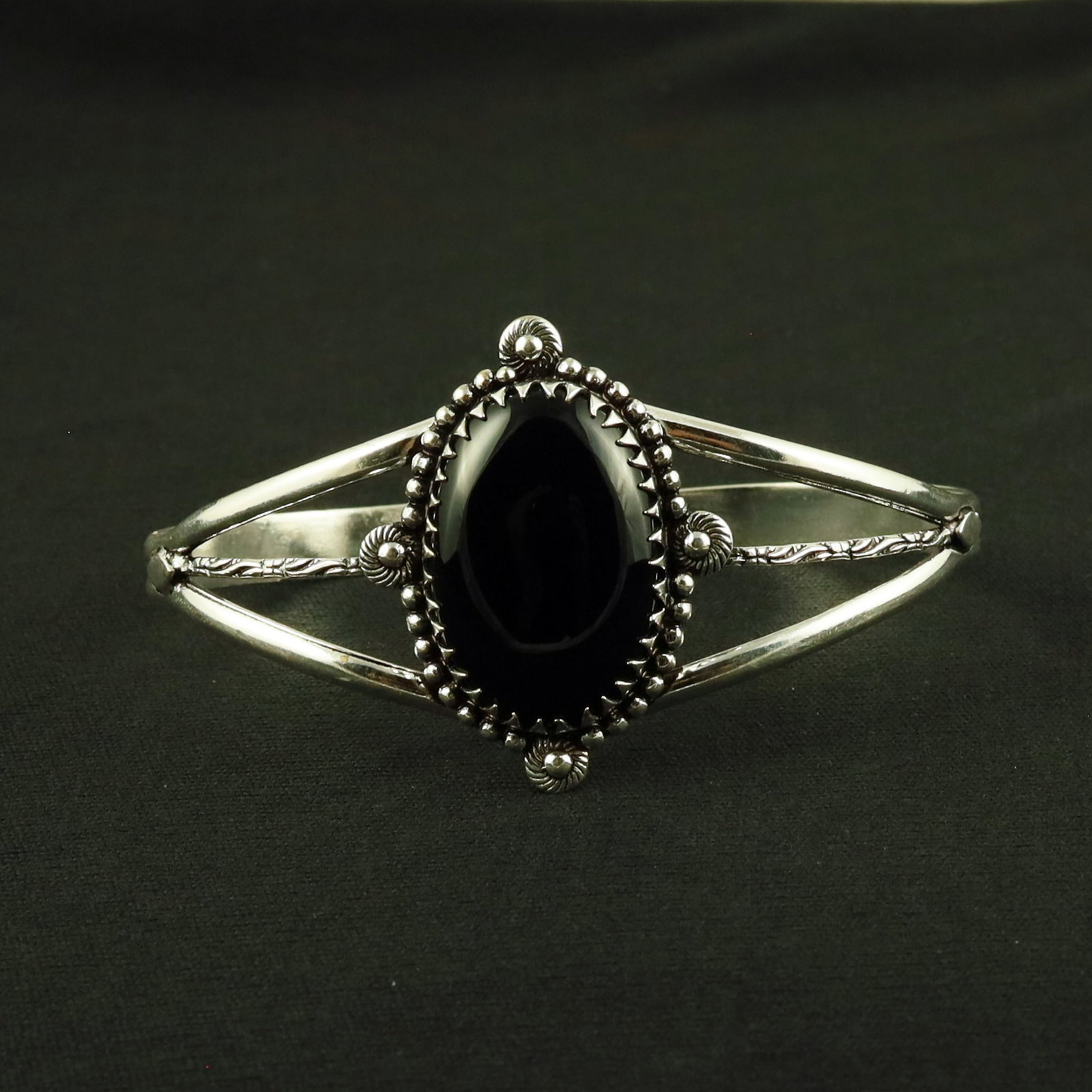Natural Black Onyx Sterling Silver Plated Handmade Cuff Bangle: Product ID: 260611121007 Product - Handmade Silver Plated Cuff Bangle Metal - 92.5 Sterling Silver Plated Bangle Size - 7.5x5.5 CM (Adjustable) Gemstone - Black Onyx Gemstone Origin - India Gemstone S