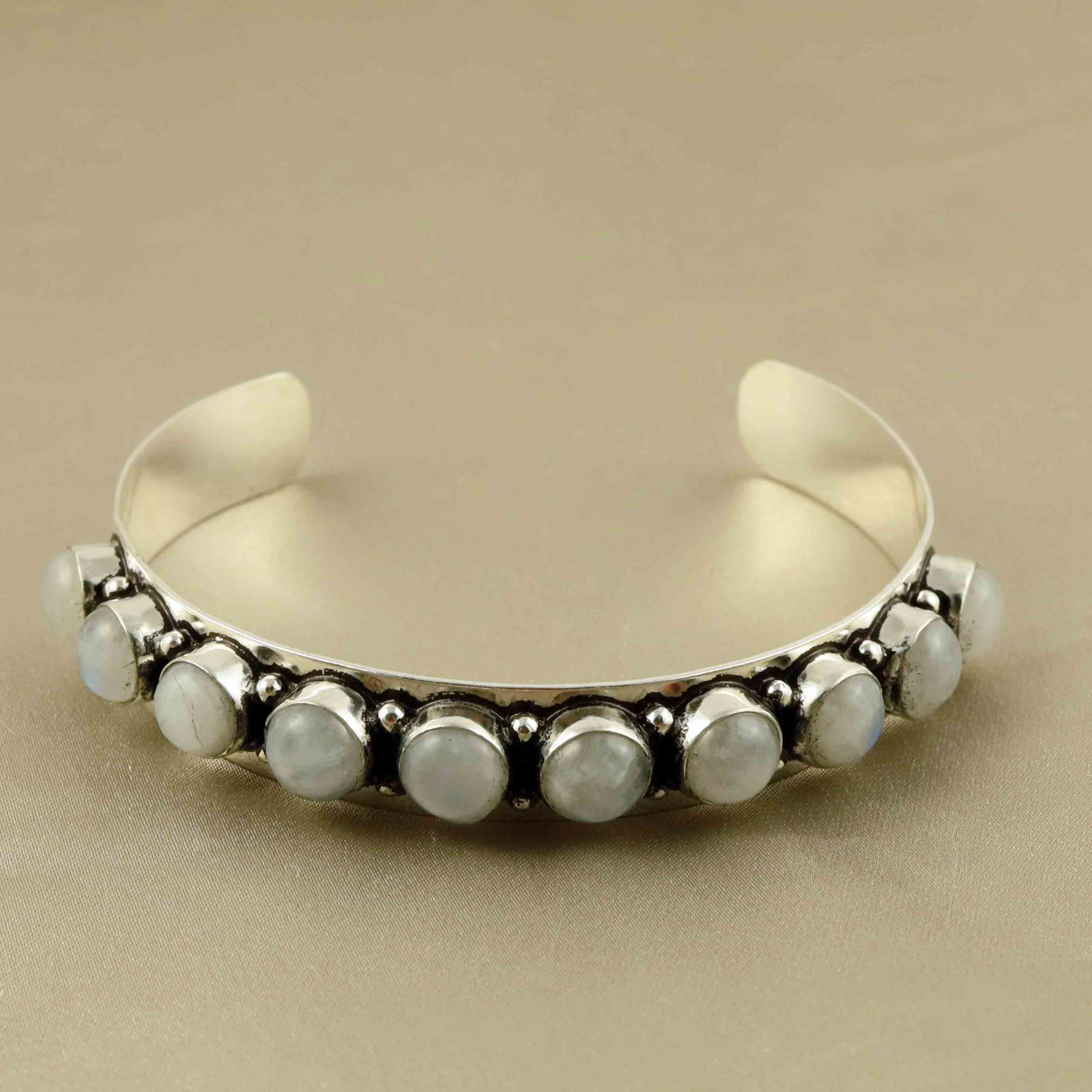 Natural Rainbow Moonstone Sterling Silver Plated Handmade Cuff Bangle: Product ID: 260607182710 Product - Handmade Silver Plated Cuff Bangle Metal - 92.5 Sterling Silver Plated Bangle Size - 6.5x5.5 CM (Adjustable) Gemstone - Rainbow Moonstone Gemstone Origin - India Gem