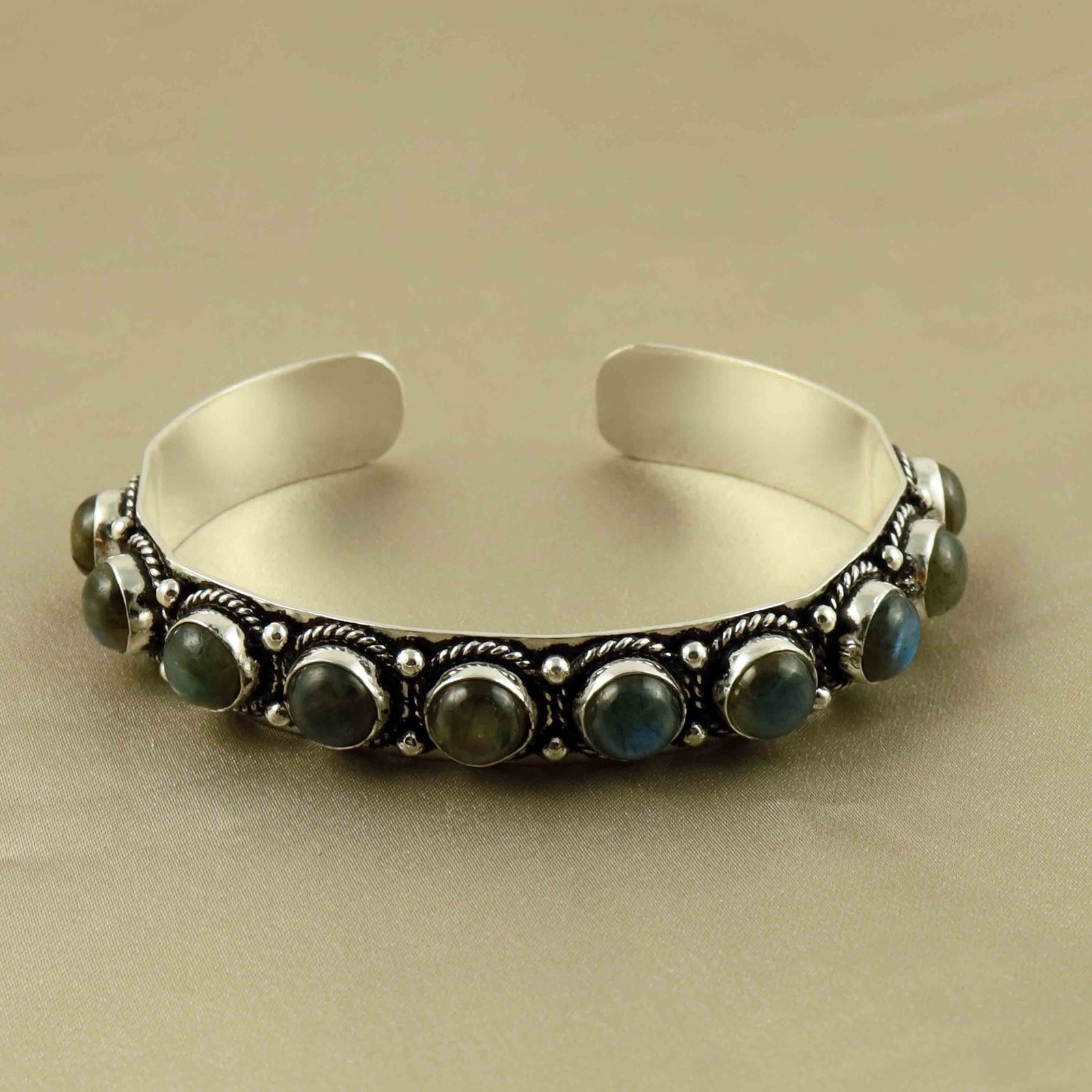Natural 8MM Labradorite Sterling Silver Plated Handmade Cuff Bangle: Product ID: 260607173026 Product - Handmade Silver Plated Cuff Bangle Metal - 92.5 Sterling Silver Plated Bangle Size - 6.5x5.5 CM (Adjustable) Gemstone - Labradorite Gemstone Origin - Canada Gemstone