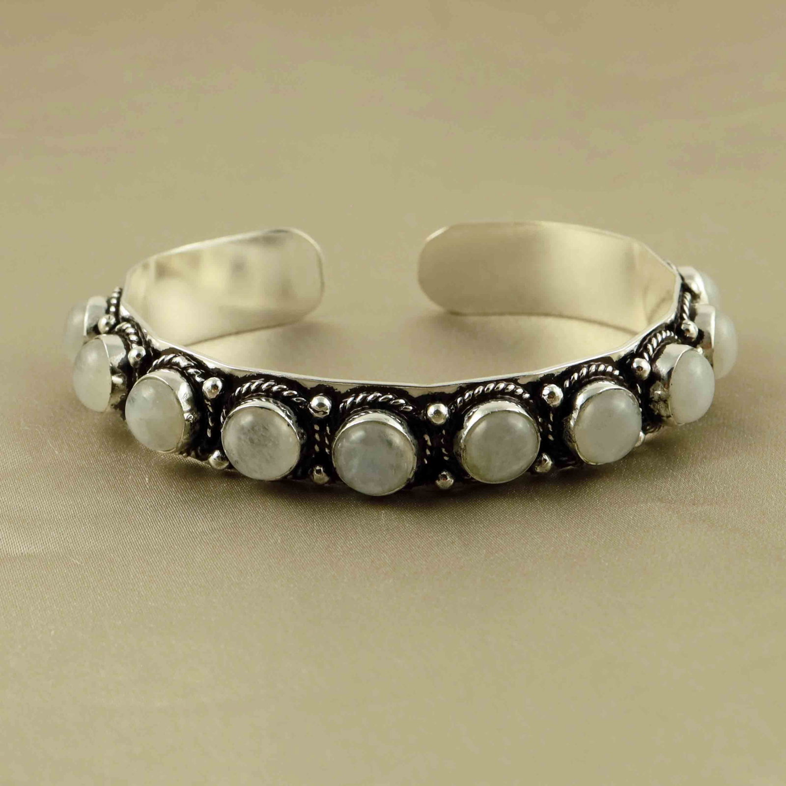 Natural Rainbow Moonstone Sterling Silver Plated Handmade Cuff Bangle: Product ID: 260607172552 Product - Handmade Silver Plated Cuff Bangle Metal - 92.5 Sterling Silver Plated Bangle Size - 6.5x5.5 CM (Adjustable) Gemstone - Rainbow Moonstone Gemstone Origin - India Gem